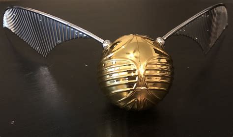 Harry Potter Snitch The Golden Snitch: A Magical Enigma In The Harry Potter Universe